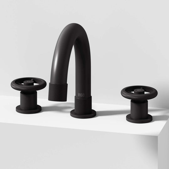 Matte black widespread bathroom faucet with high arc spout and ceramic disc valve