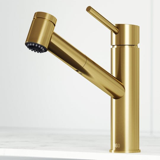 Matte brushed gold single handle kitchen faucet with high arc spout and pull-out spray