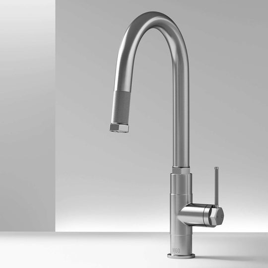 Stainless steel single handle kitchen faucet with pull-down sprayer