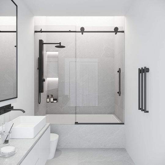 Stainless steel hardware on matte black frameless sliding door with clear glass