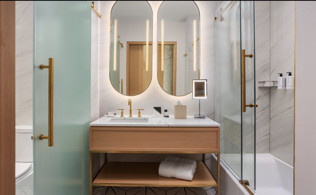 VIGO Goes Gold at the Hard Rock Hotel: A Matte Brushed-Gold Frameless Shower Door