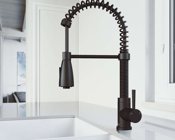 Matte black VIGO Brant pull-down kitchen faucet in a bright modern kitchen, showing an even, spot-resistant PVD-style finish