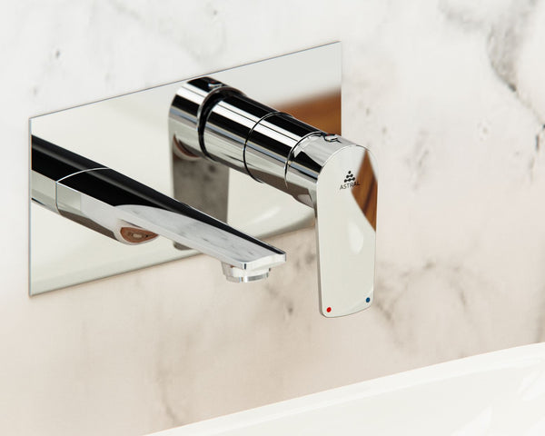 Sleek chrome wall-mounted faucet against a marble background, perfect for luxury and modern bathroom designs.
