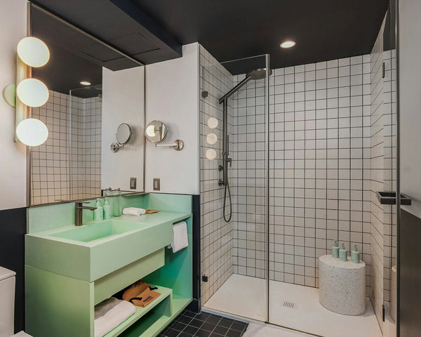 VIGO at Recess Hotel & Club, Savannah: Faucets, Pivot Shower Doors &       Custom Shower Towers