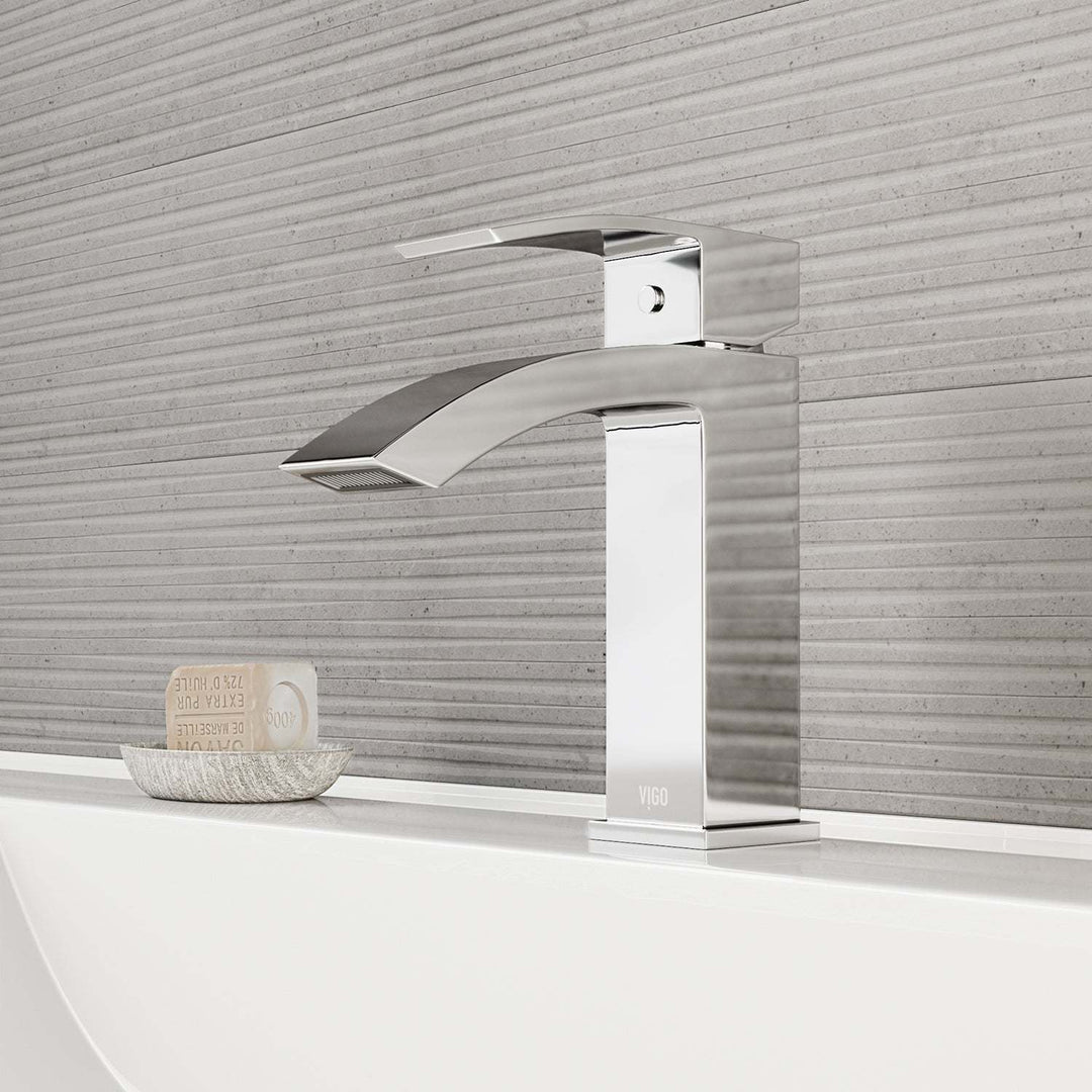 Chrome single hole bathroom faucet with lever handle and waterfall spout