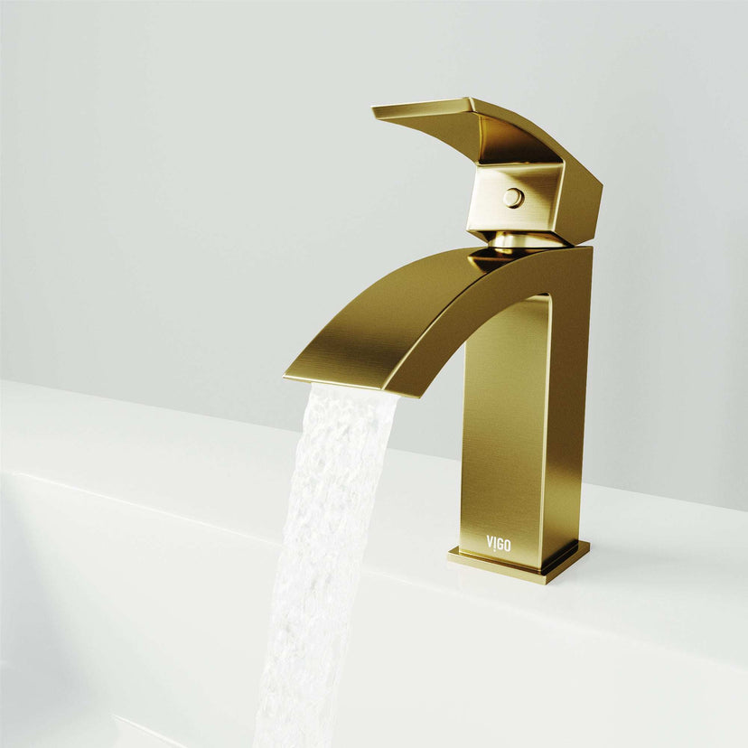 Waterfall spout bathroom faucet in matte brushed gold finish with hot/cold indicators
