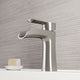 Brushed nickel single hole bathroom faucet with lever handle and waterfall spout