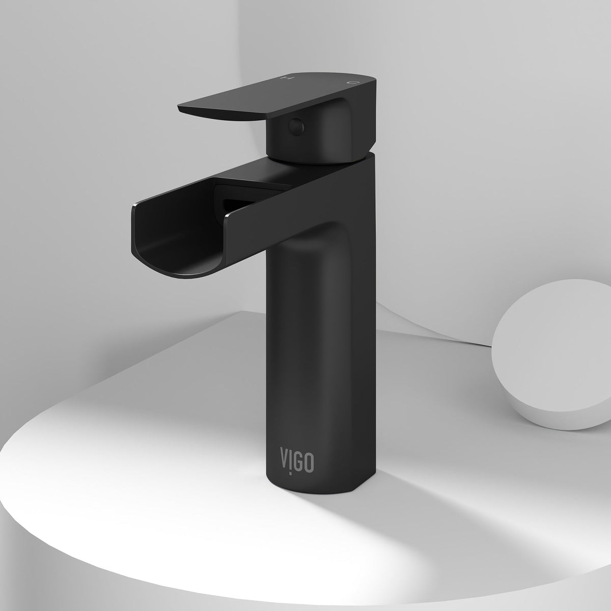 Matte black single hole bathroom faucet with waterfall spout and lever handle
