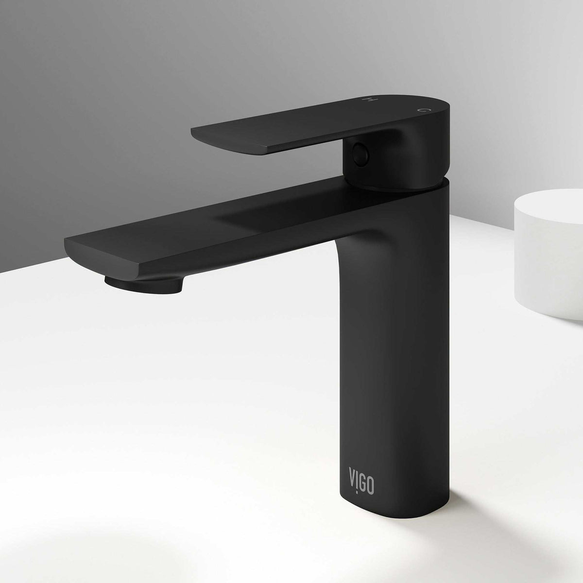 Matte Black single hole bathroom faucet with lever handle and mid arc spout