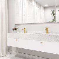 Deck-mounted faucet with mid arc spout and matte brushed gold finish