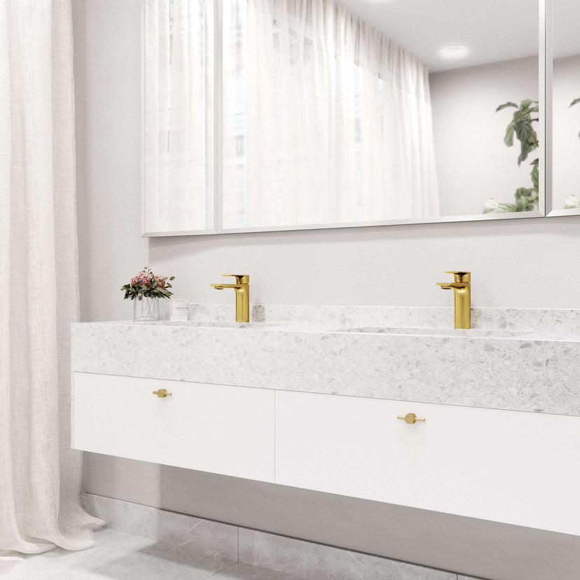 Deck-mounted faucet with mid arc spout and matte brushed gold finish