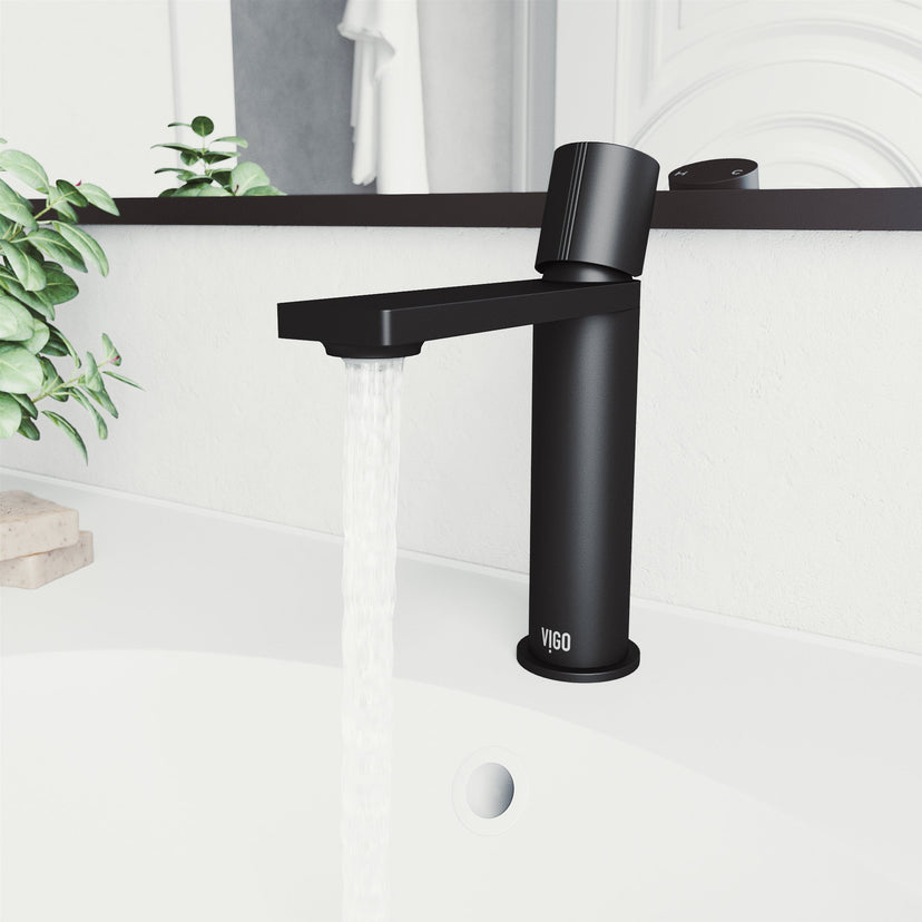 Brass bathroom faucet in matte black finish with included mounting hardware