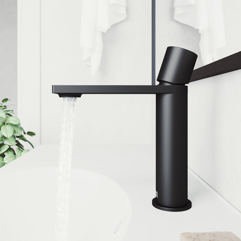 Low lead single hole faucet with matte black finish and waterfall spout