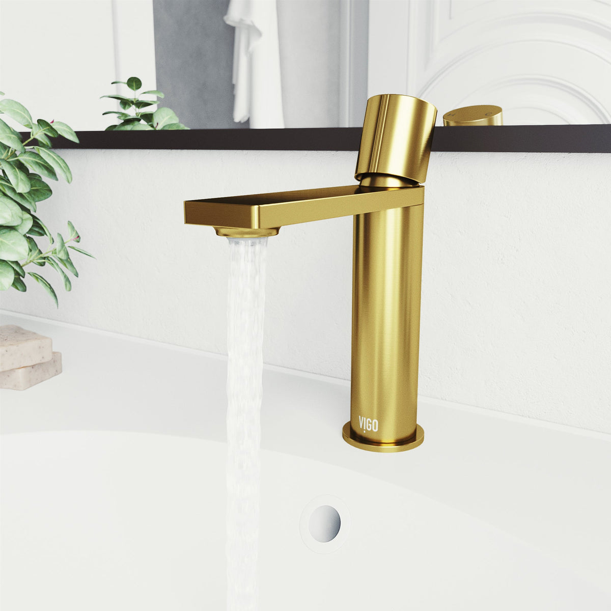 Brass bathroom faucet in matte brushed gold finish with included mounting hardware