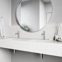 Brass bathroom faucet in brushed nickel finish with included mounting hardware