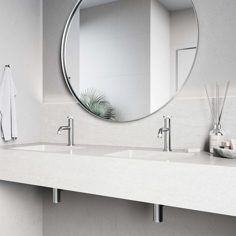 Brass bathroom faucet in brushed nickel finish with included mounting hardware