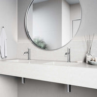 Brass bathroom faucet in chrome finish with included mounting hardware
