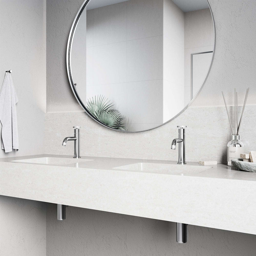 Brass bathroom faucet in chrome finish with included mounting hardware