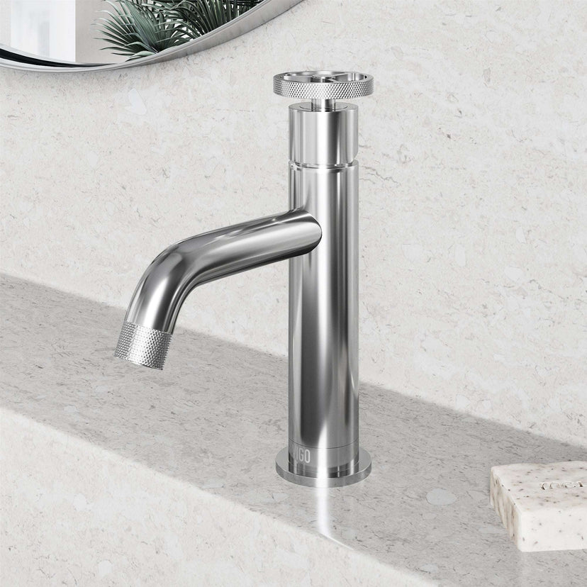 Low lead, drip-free faucet with hot/cold indicators and compression connections