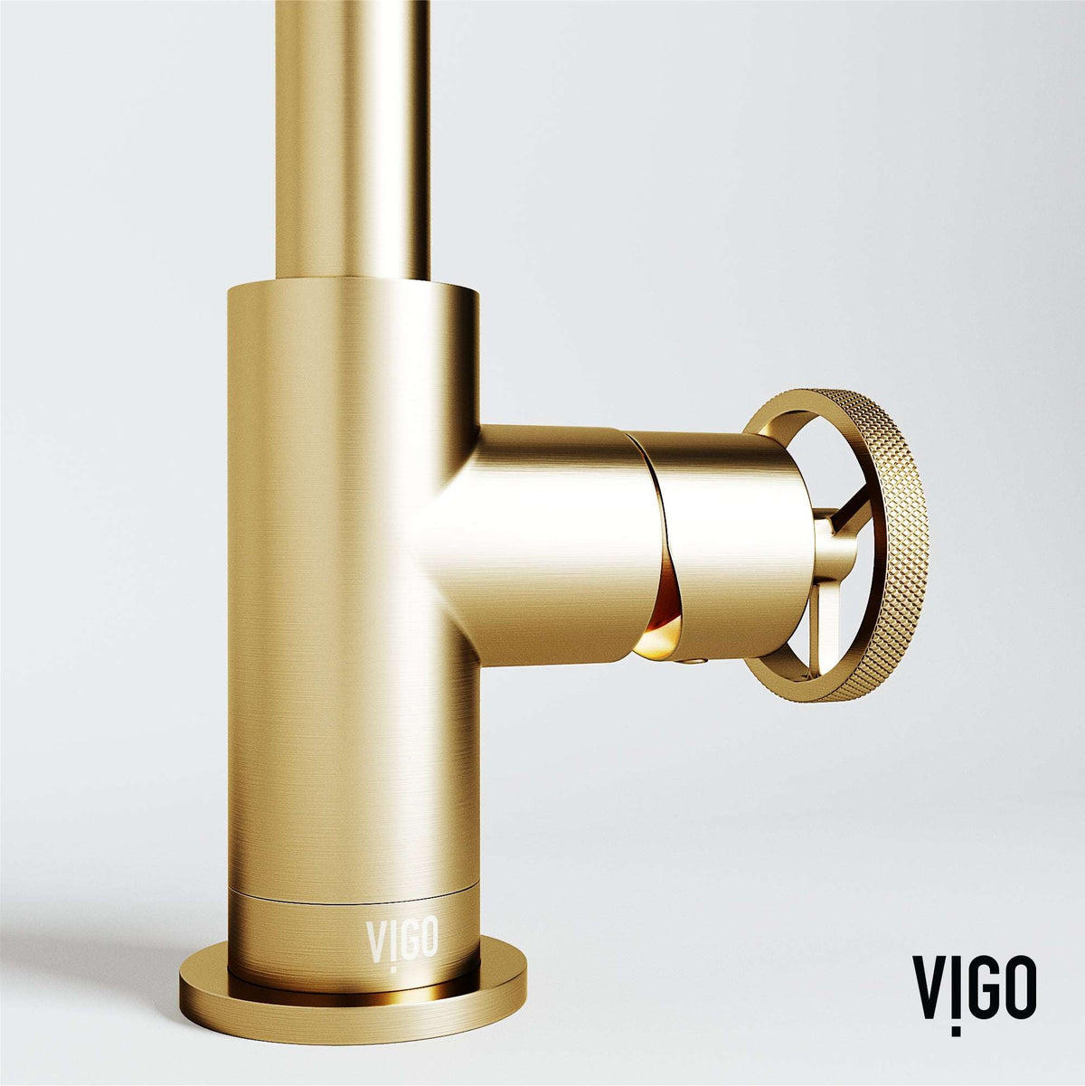 Modern deck-mounted faucet in matte brushed gold with knob handles and low flow design