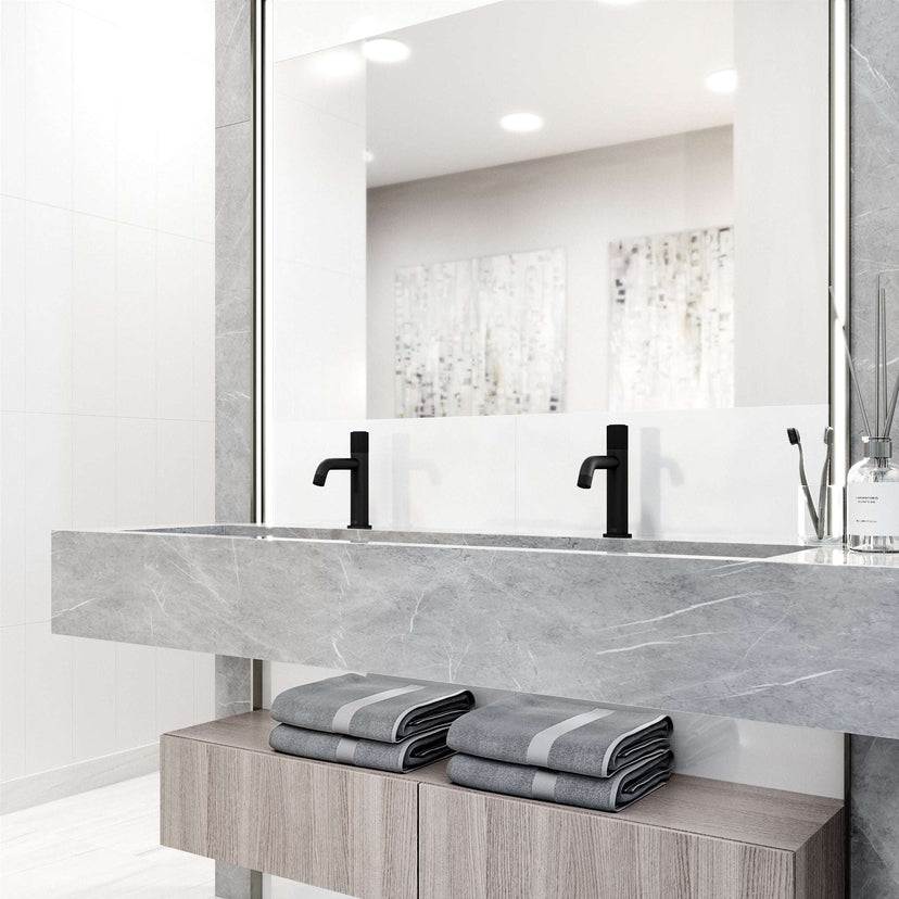 Contemporary style bathroom faucet with matte finish, knob handle, and compression connection