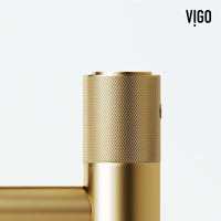 Ceramic disc cartridge faucet in matte brushed gold, deck-mounted with modern design