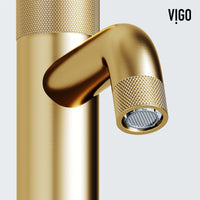 Single hole bathroom faucet with matte brushed gold finish and 8-inch assembled height