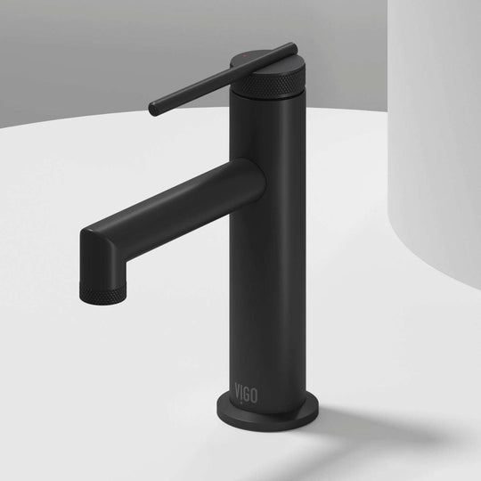 Matte Black single hole bathroom faucet with lever handle and mid arc spout