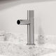 Brushed nickel bathroom faucet featuring ceramic disc cartridge and compression connections