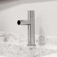 Chrome bathroom faucet featuring ceramic disc cartridge and compression connections