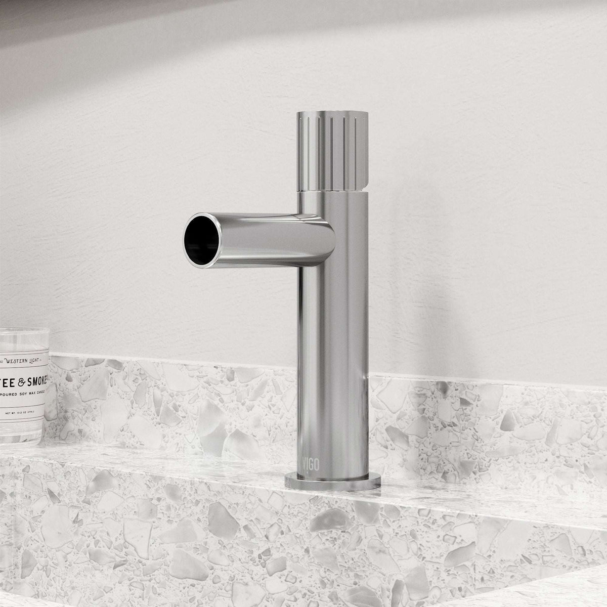 Chrome bathroom faucet featuring ceramic disc cartridge and compression connections