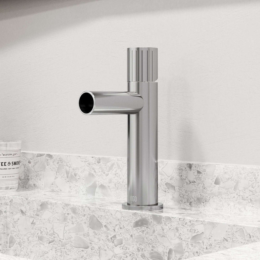 Chrome bathroom faucet featuring ceramic disc cartridge and compression connections