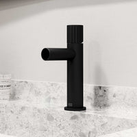 Matte black bathroom faucet featuring ceramic disc cartridge and compression connections