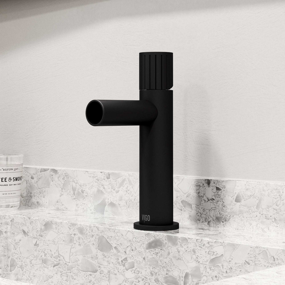 Matte black bathroom faucet featuring ceramic disc cartridge and compression connections