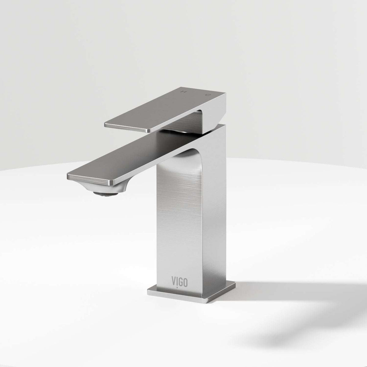 Brushed Nickel single hole bathroom faucet with lever handle and mid arc spout