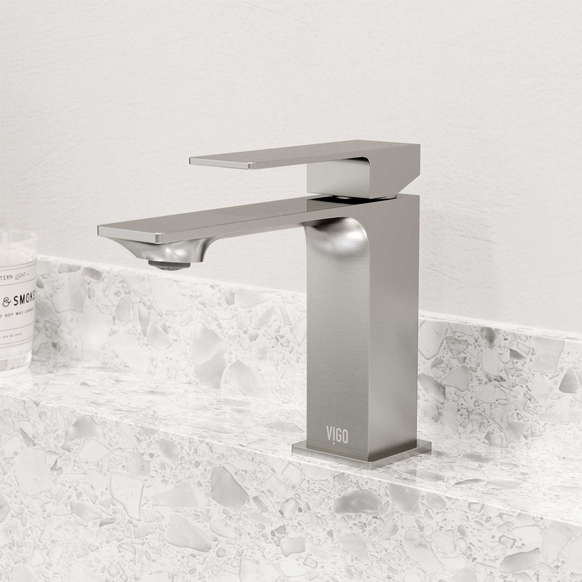 Contemporary style faucet with included mounting hardware and supply lines