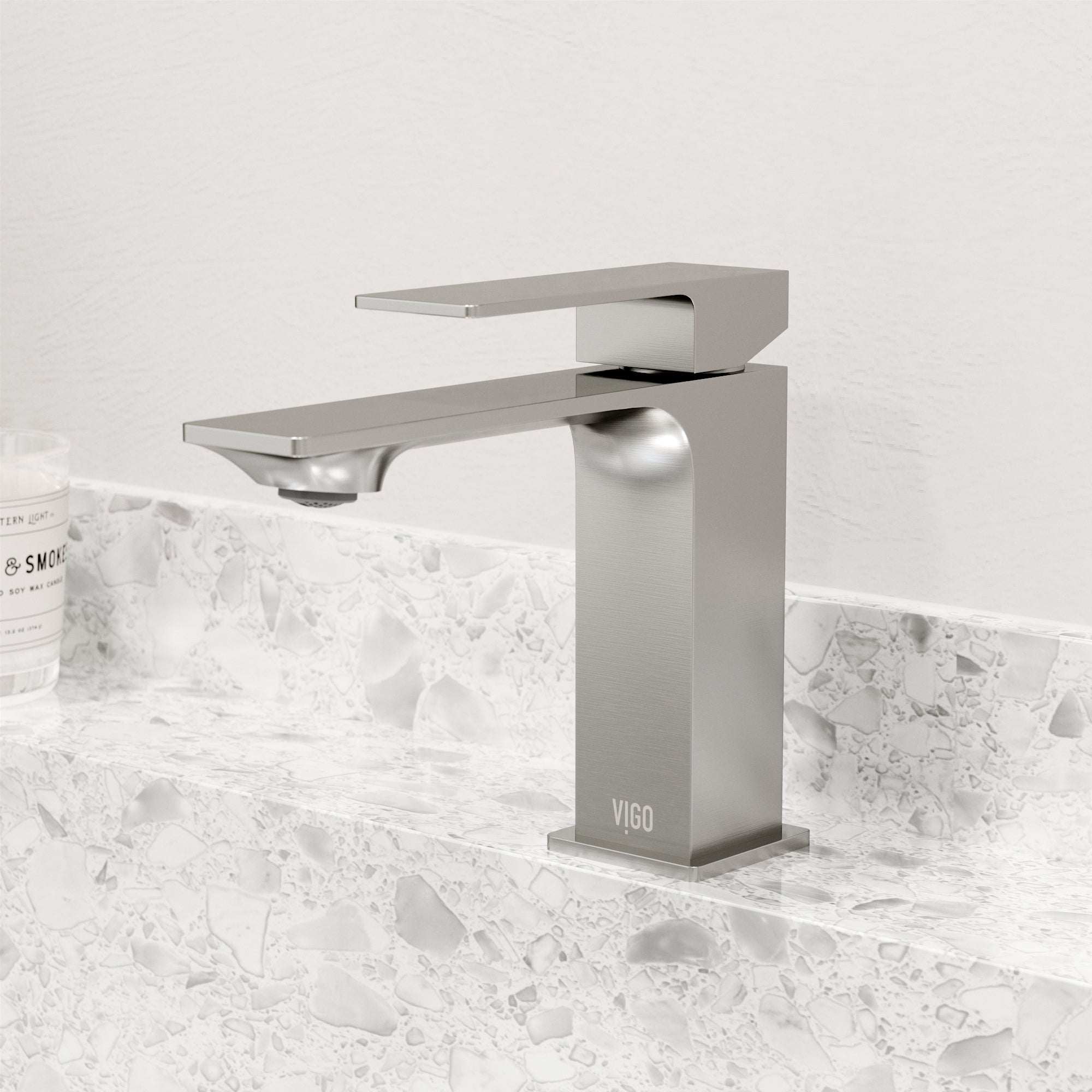 Contemporary style faucet with included mounting hardware and supply lines