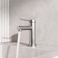 Single hole brass faucet with lever handle and compression connection