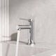 Single hole brass faucet with lever handle and compression connection