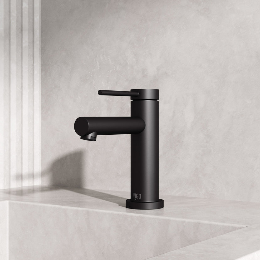Matte Black single hole bathroom faucet with lever handle and mid arc spout