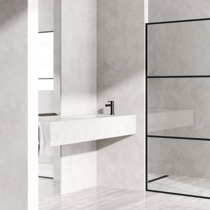 Matte black faucet featuring lever handle and modern contemporary style