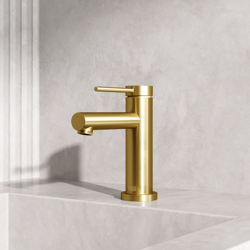 Matte brushed gold faucet featuring lever handle and modern contemporary style