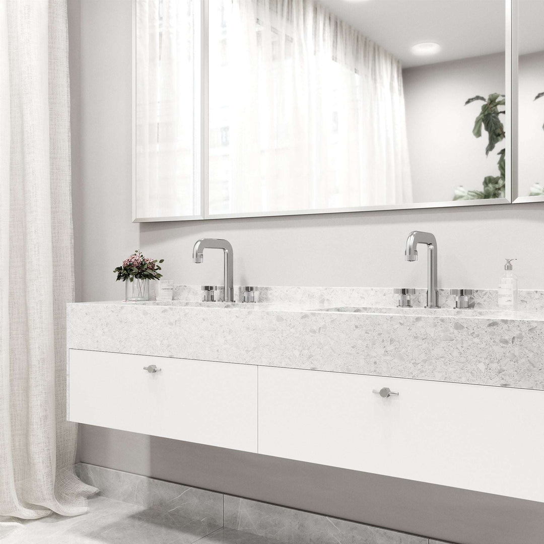 Modern deck-mounted 3-hole faucet in brushed nickel with knob handles and low flow