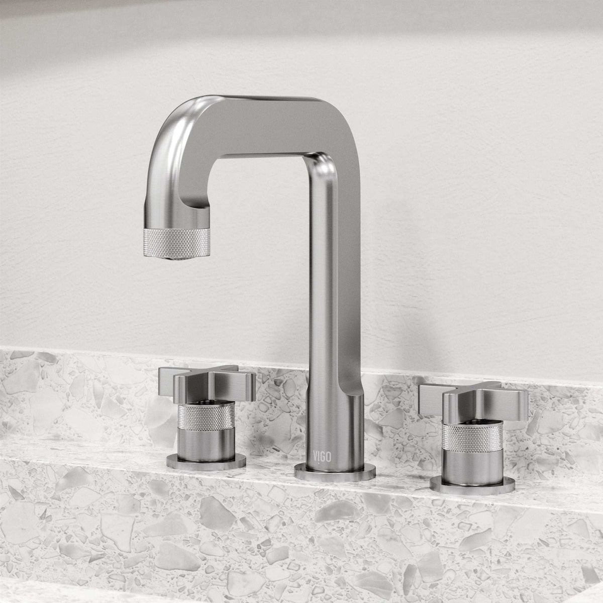 Widespread faucet with low lead brass construction and hot/cold indicators