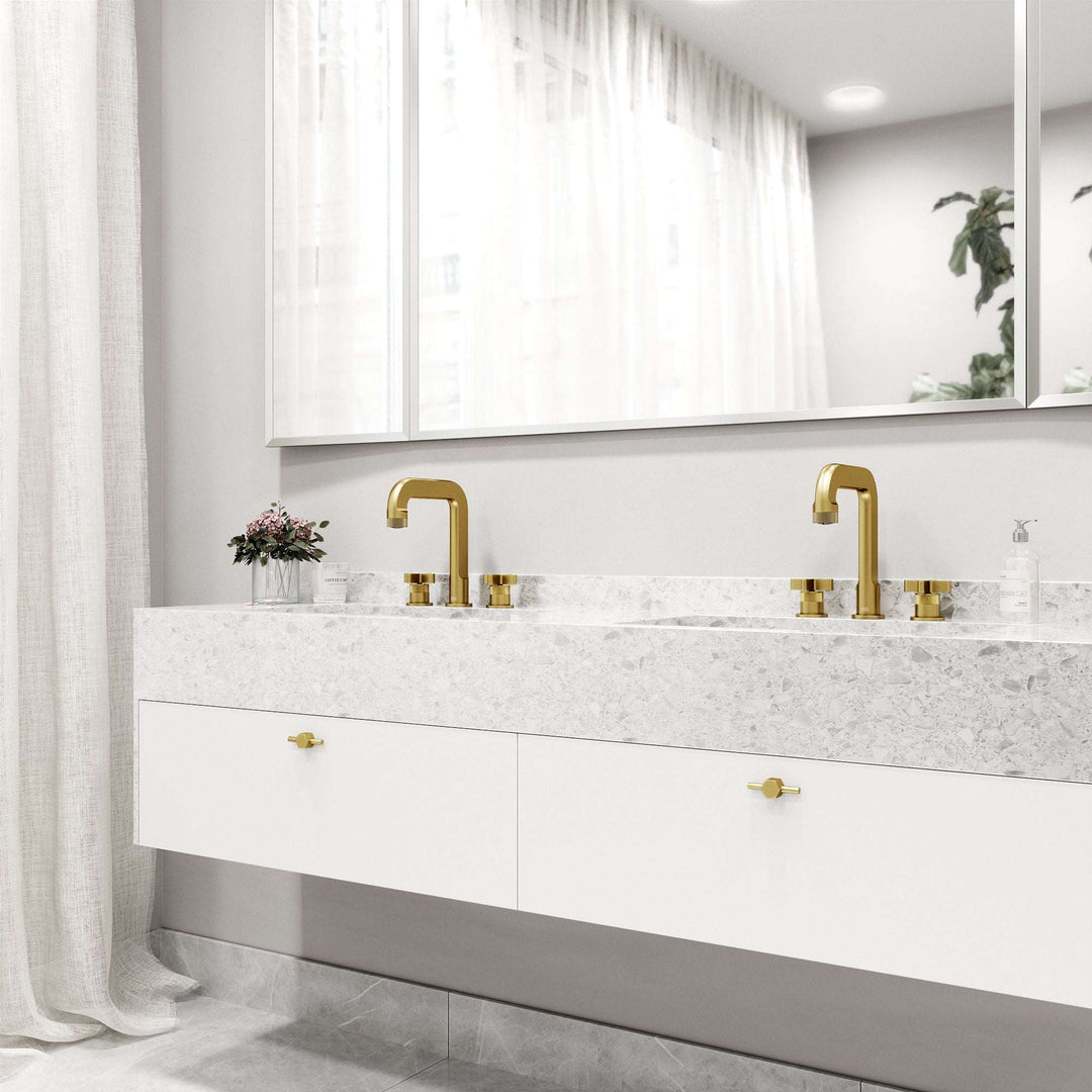 Modern deck-mounted 3-hole faucet in matte brushed gold with knob handles and low flow