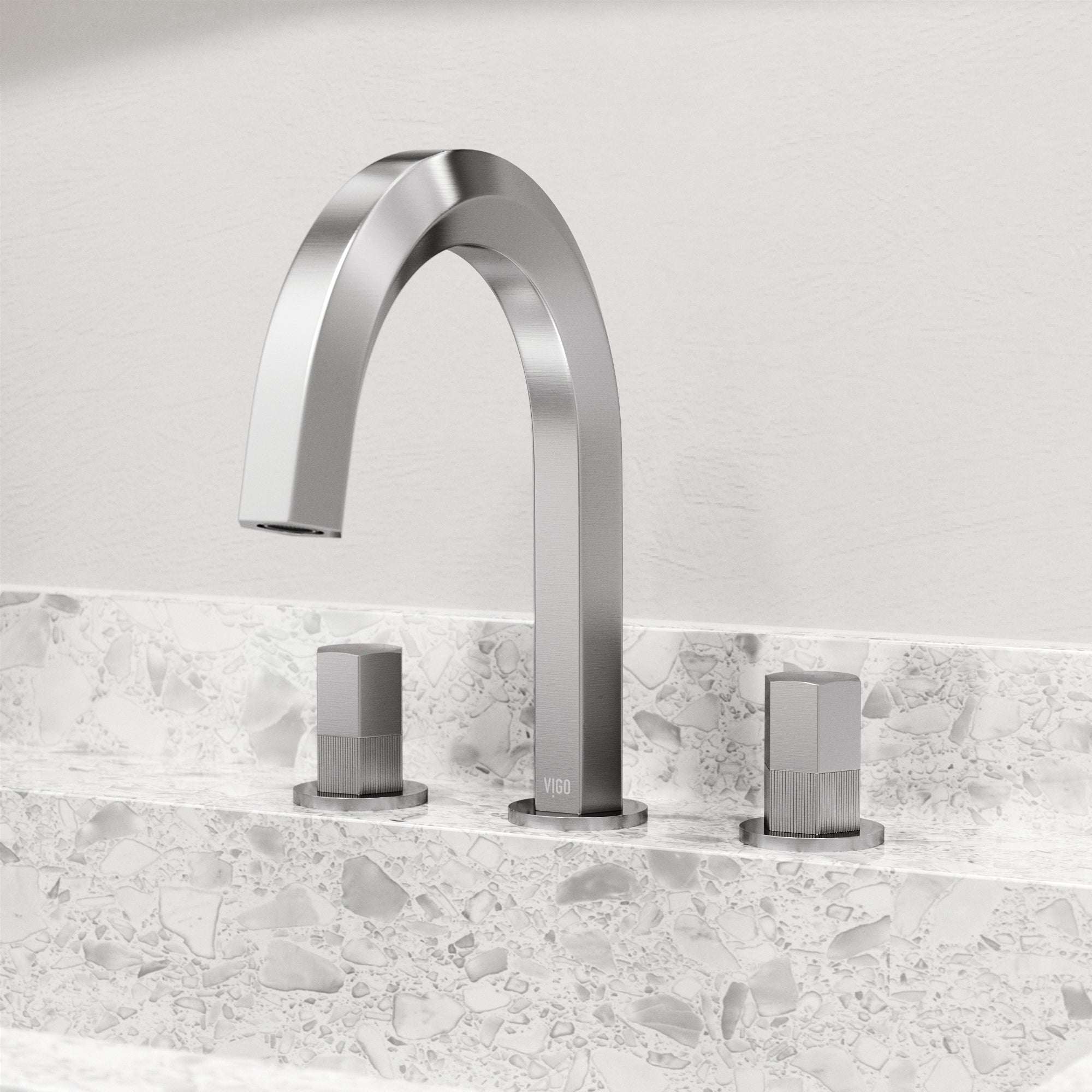 Deck mounted widespread faucet with hot/cold indicators and drip free design