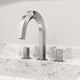Deck mounted widespread faucet with hot/cold indicators and drip free design