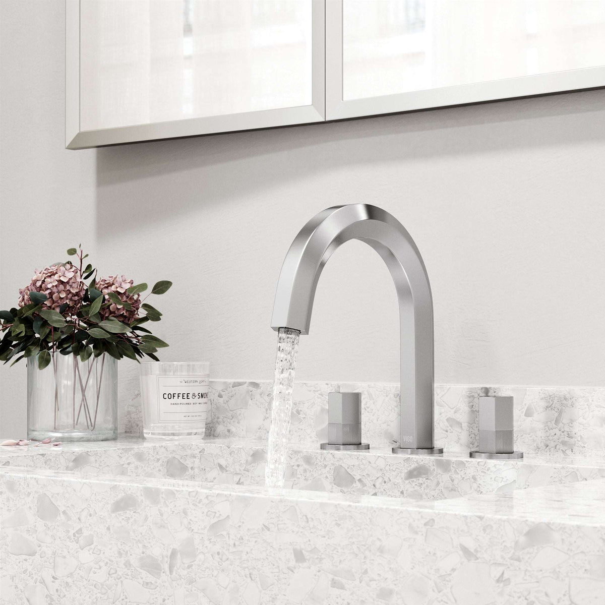 Low lead brushed nickel faucet featuring waterfall spout and easy installation