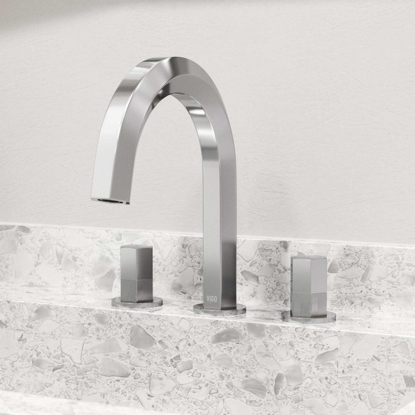 Deck mounted widespread faucet with hot/cold indicators and drip free design