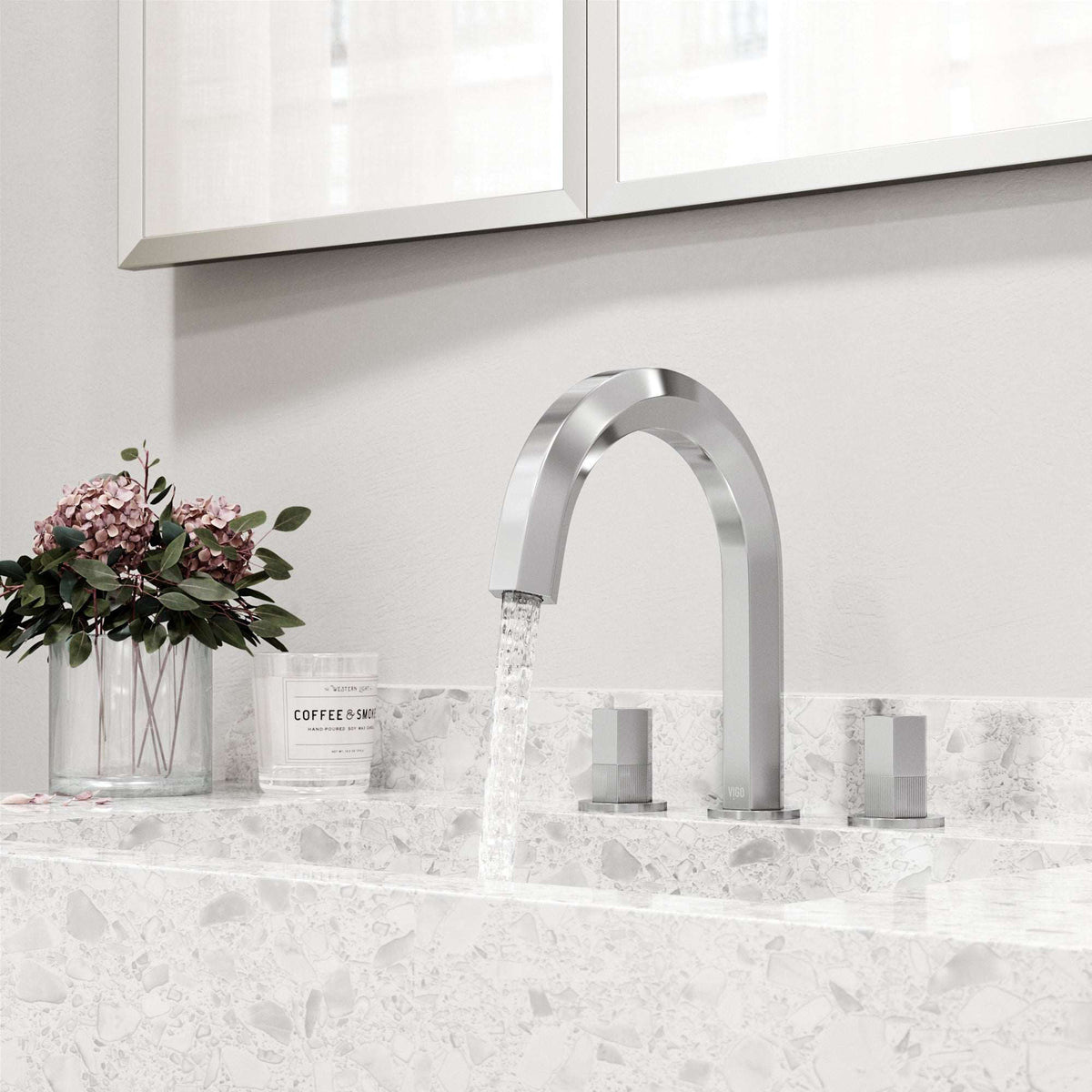 Low lead chrome faucet featuring waterfall spout and easy installation